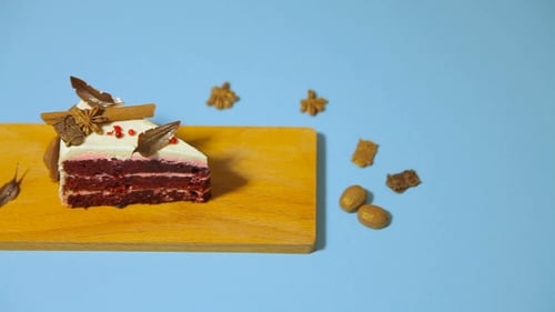 Red Velvet Cake Slice with Cinnamon Sticks