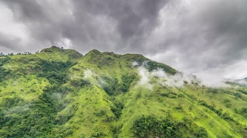 Green Mountain With Low Clouds