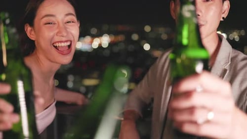 Young asian woman with sparklers is dancing and celebrating a new year