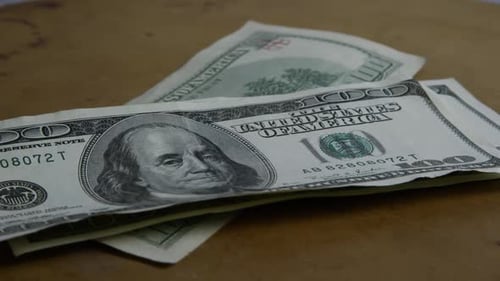 Stack of One Hundred US Dollar Bills