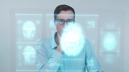 Male Surgeon Studying Data On A Futuristic Interface. Cinema