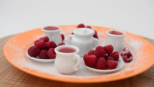 Fresh Raspberries Garnished with Sweet Accoutrements