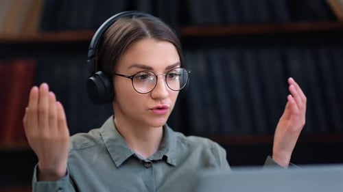 Young Woman Talking During Video Conference Call