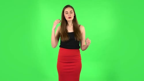 Young Tired Woman Cooling Herself By Her Hand, Suffering From High Temperature Weather. Green Screen