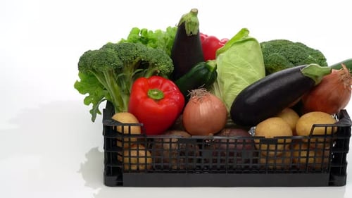 Crate of Fresh Vegetables on a White Background