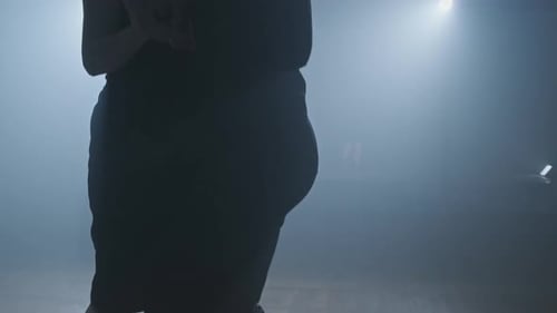 Legs of Couple Dancing Tango in Dark Smoky Studio in Slow Motion in FHD