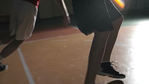 Young Adults Playing Basketball, Dribbling and Shooting