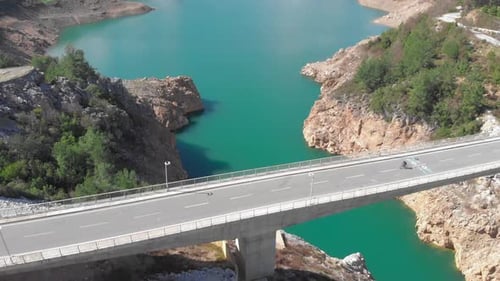 Cycling riding on a bridge