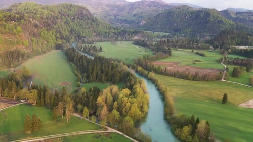 Scenic Aerial View of River Flowing Through Landscape