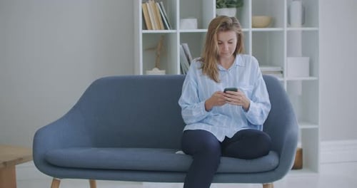 Portrait of Happy Business Woman Enjoy Success on Mobile Phone at Home Office. Closeup Joyful Girl