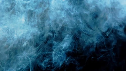 Abstract Light Blue Smoke Drifting on Black