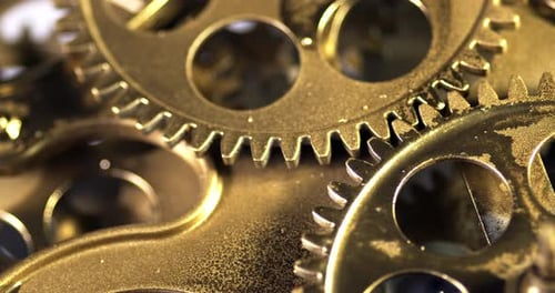 Close Up of Gold Gears Turning