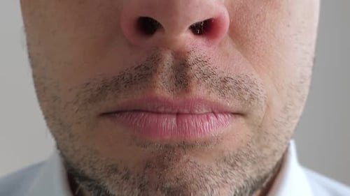 Adult Man Using Nasal Spray, Close Up
