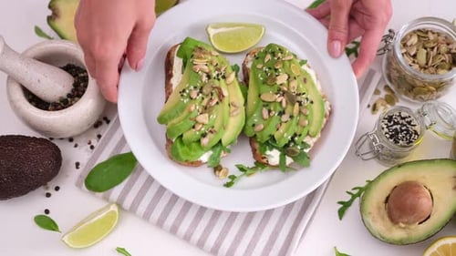 Hands Place Avocado Toast Plate Among Ingredients