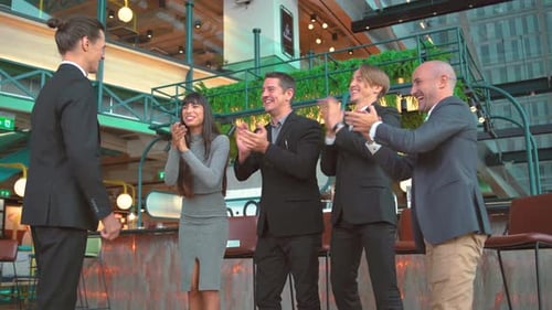 Happy boss and colleagues office team applaud support successful proud best male business employee