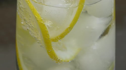 Sparkling Lemon Drink with Ice in Glass