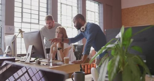 Young creative professionals working in a modern office