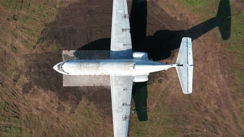 Abandoned Plane at the Airport on Green Grass