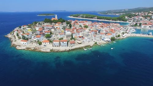 Aerial view of traditional dalmatian town with historic church in the middle
