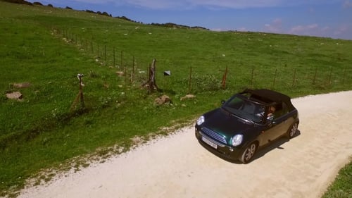Aerial View Of The Road With Driving Car