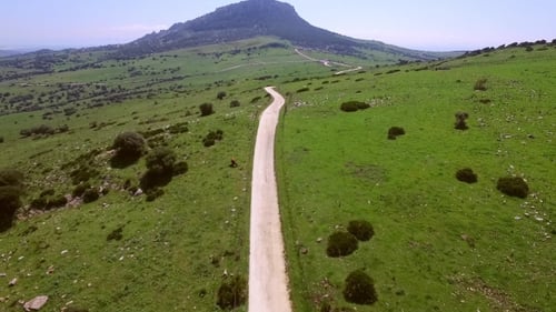 Deserted Long Gravel Road Through The Country