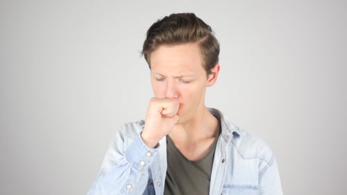 Portrait of Young Boy Coughing, Sick