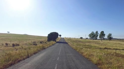 Driving On a Road In Countryside