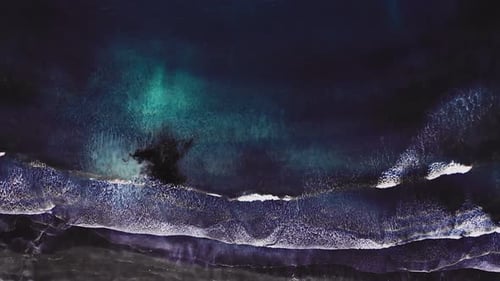 Aerial View of Beautiful Beach with View of Ocean Waves and Water Crashing on To Sandy Shore From