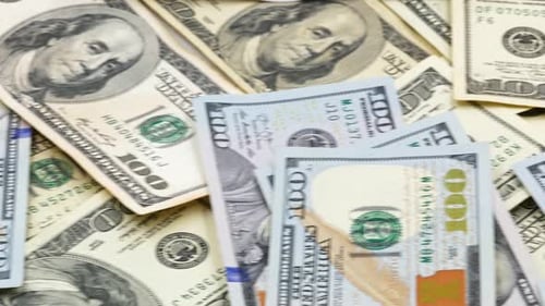 Pile of One Hundred Dollar Bills