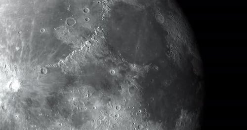 Realistic Moon Surface Slowly Rotating in Space