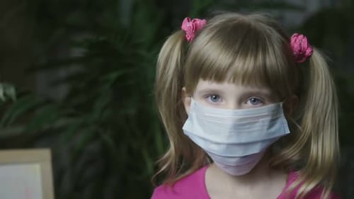 Child Wearing Face Mask for Virus Protection