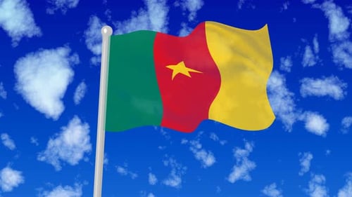 Cameroon Flag Waving Against Blue Sky With Clouds