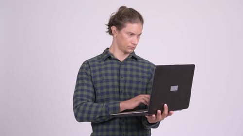 Young Adult Working on Laptop