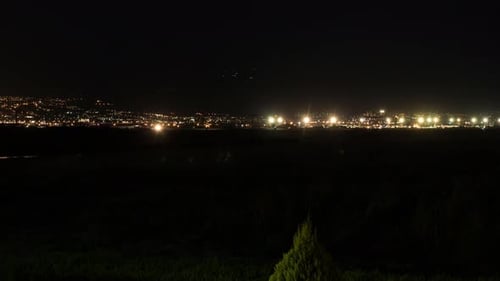 Timelapse of traffic on the road and night city