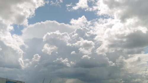 White Cumulus Clouds Turn Into Black Clouds and Become Rain Clouds Time Lapse