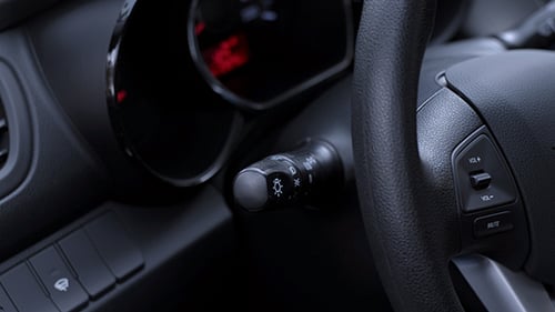 Hand Controls Signal Lights in Car