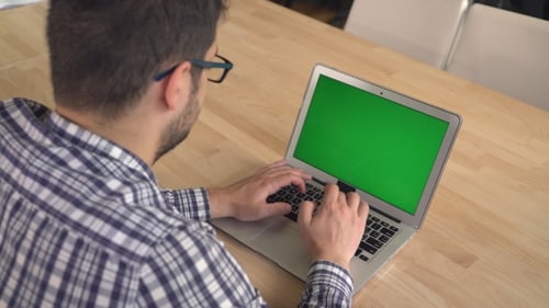 Unrecognizable Man Working On The Computer.