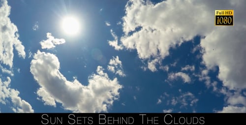 Sun Sets Behind The Clouds