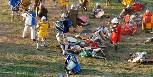 Medieval Reenactment Battle with Swords, Axes, and Spears