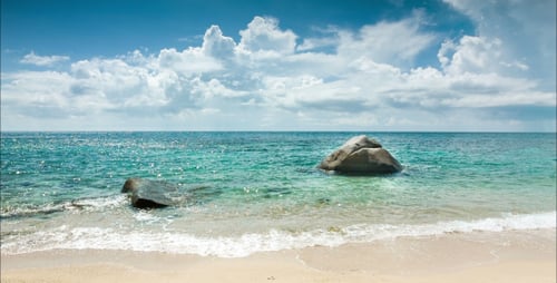 Sea With Two Stones On The Beach