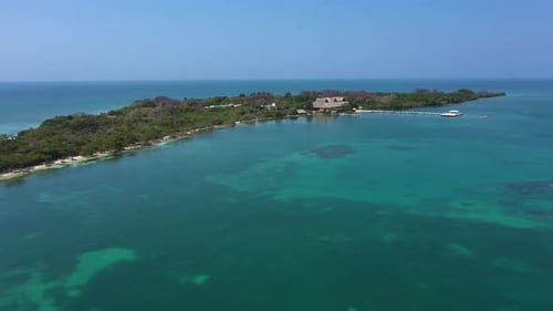 Beautiful Beach with White Sand Turquoise Ocean Blue Sky on a Sunny Day