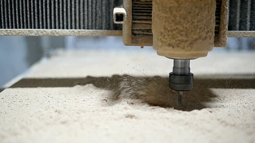 Automated CNC Machine Cutting Wood Material