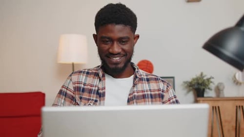 African American Making Conference Calling By Webcam Focused Student Study Online at Home Office