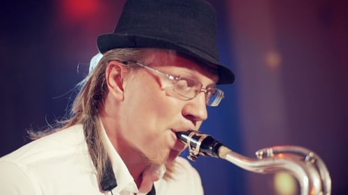 Man Playing The Saxophone On Stage