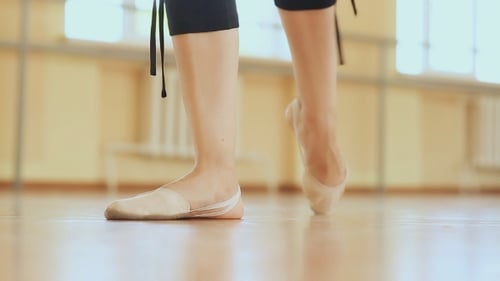 Elegant Feet Practicing Ballet Positions