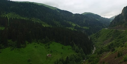 Aerial View of Lush Green Mountain Valley