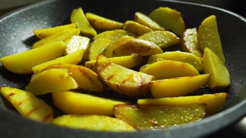 Delicious Potato Wedges Cooked on a Pan