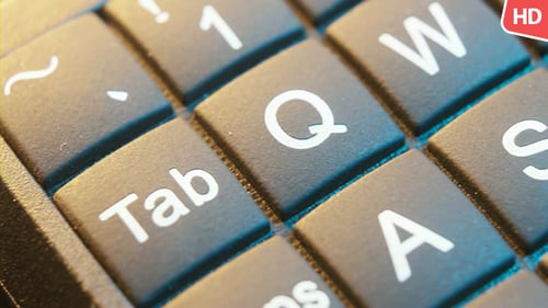 Close-up of Computer Keyboard Moving Across Keys