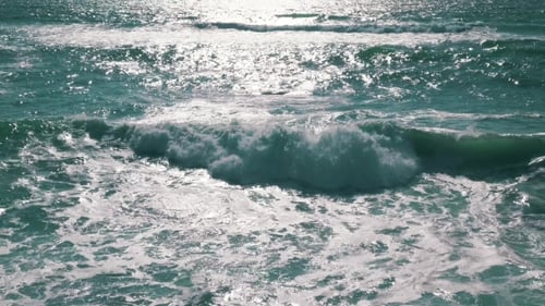 Ocean Waves With Sun Reflection