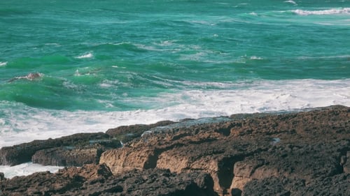 Ocean Waves Breaking On Rock